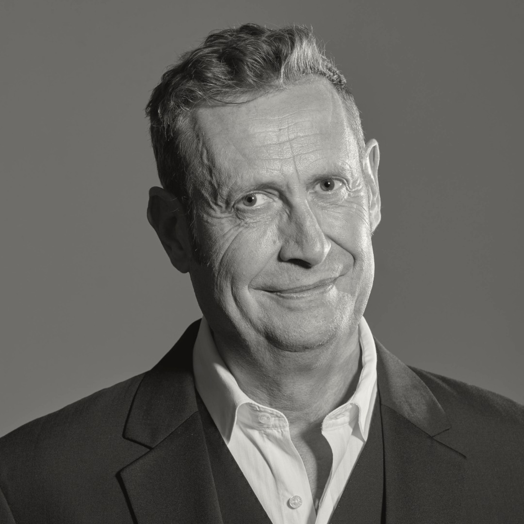 Headshot of Andrew Mark Sewell.