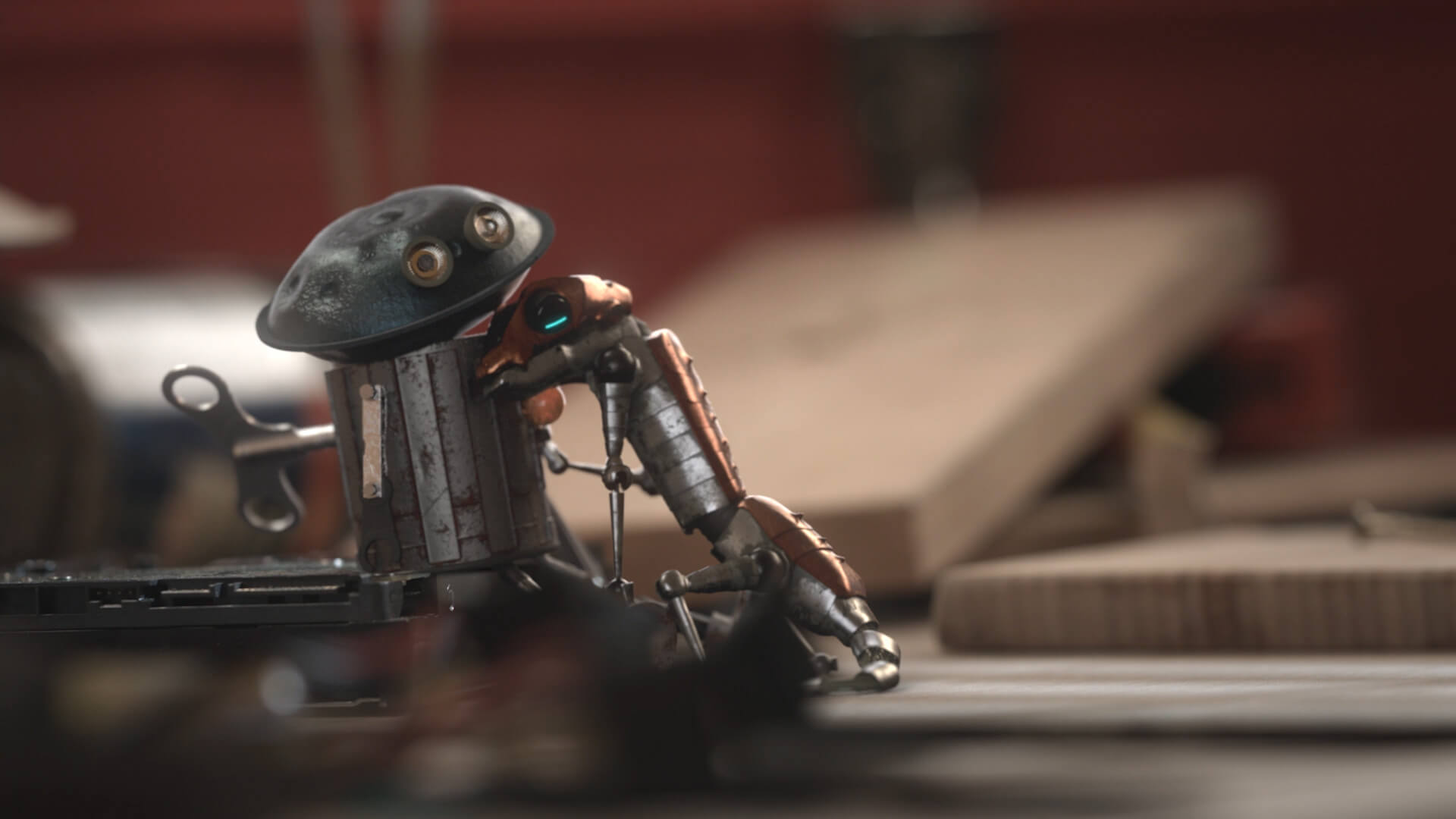 An animated lizard hugging a metal wind up toy