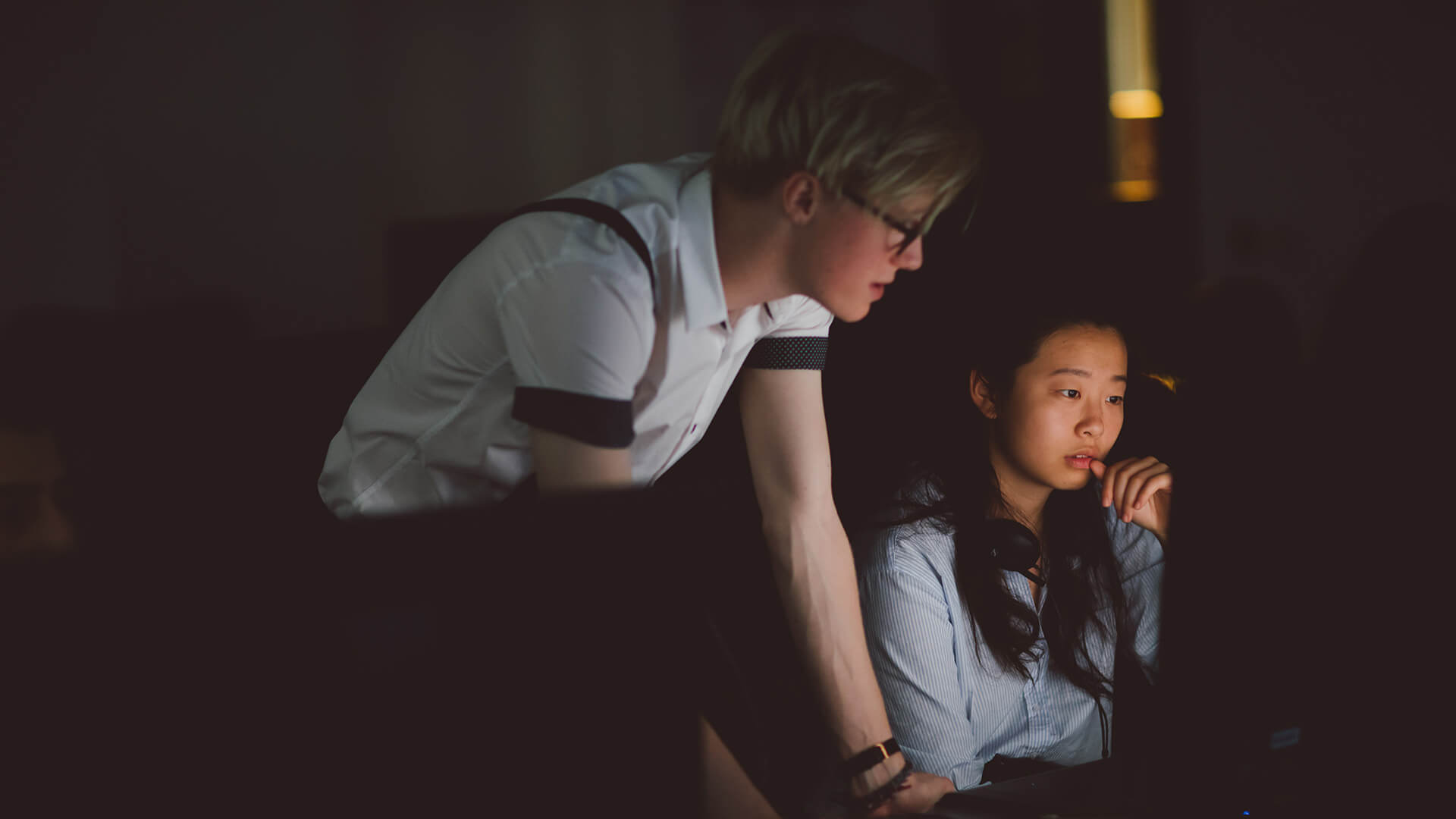 Tutor helping a student