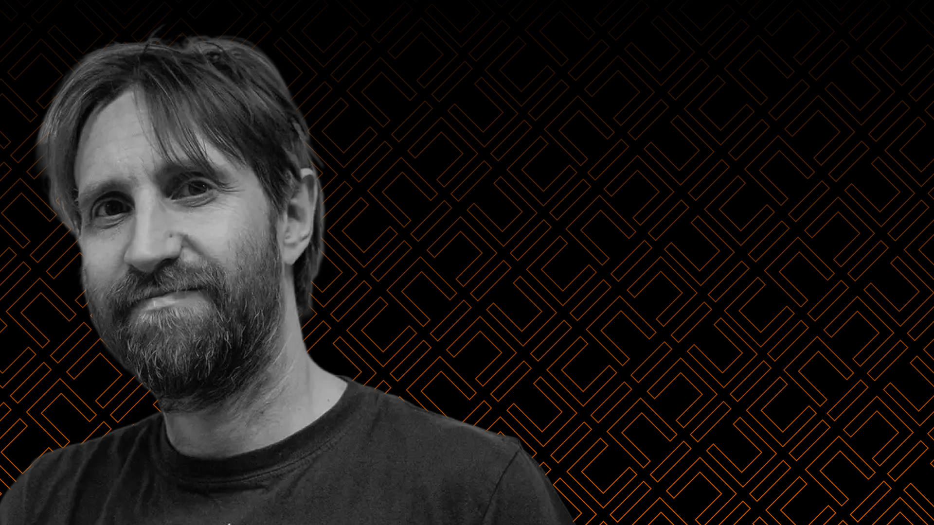 Greyscale headshot of 3D VFX Tutor Dan Shutt