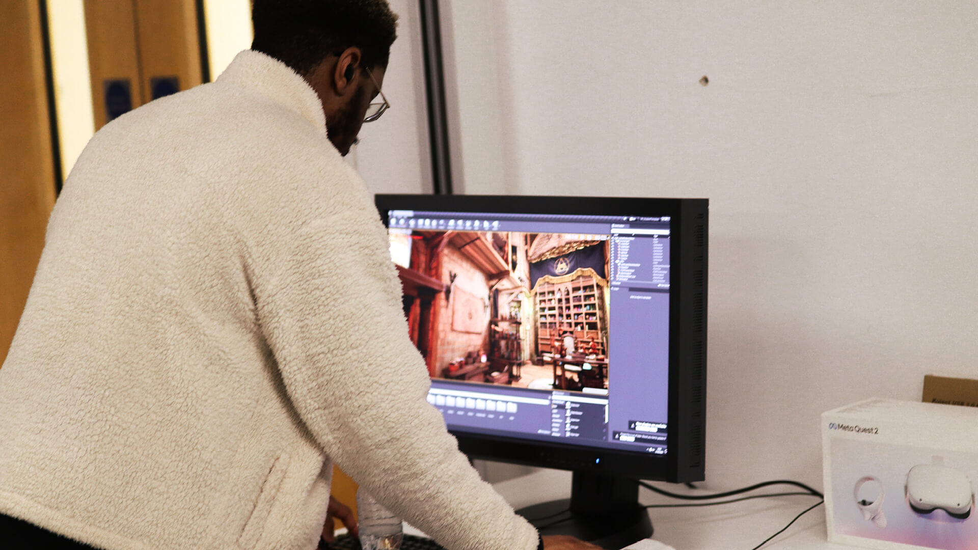 student working configuring vr environment