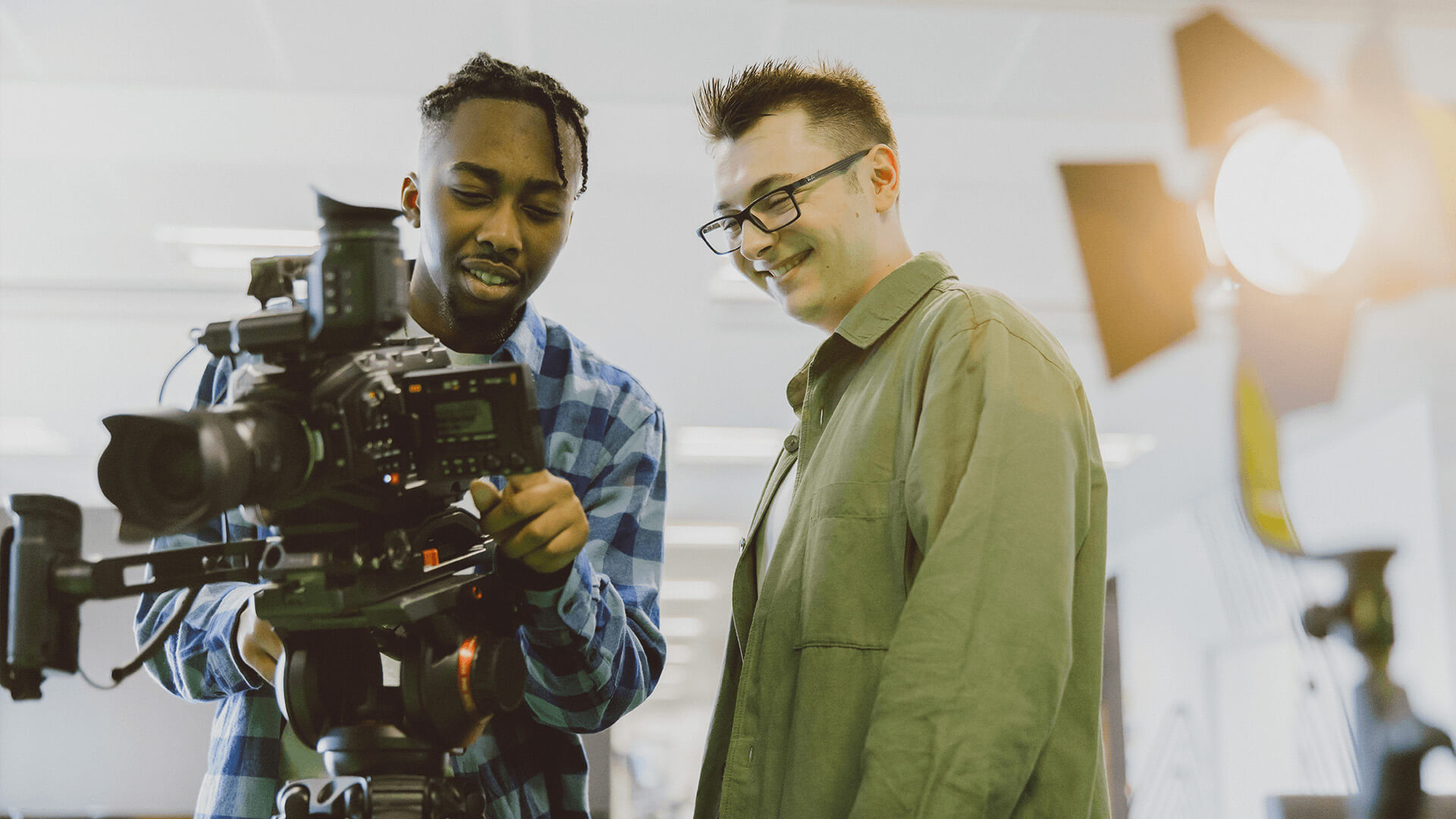 Pair of students using camera equipment at Escape Studios