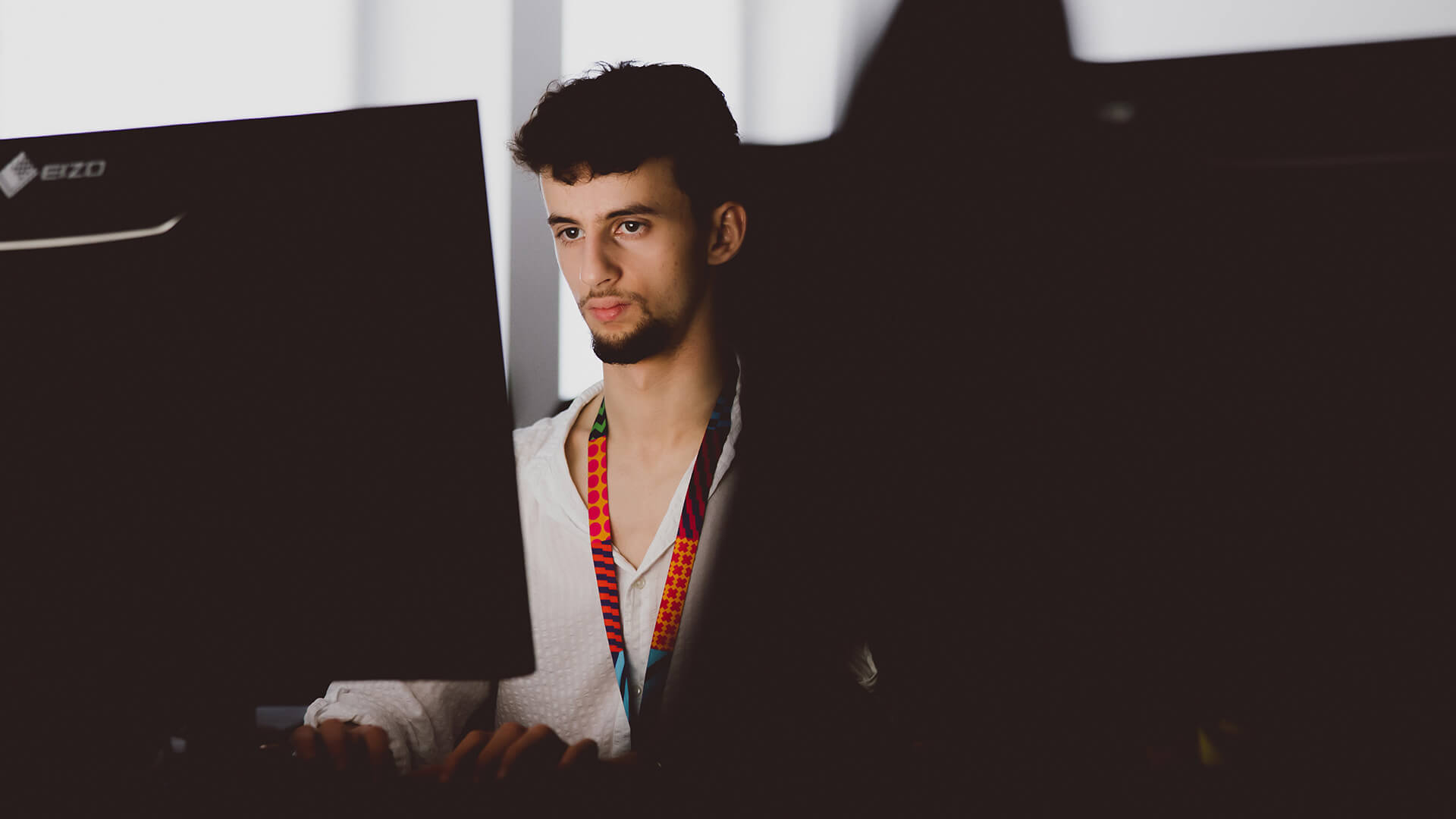 Male student using computer
