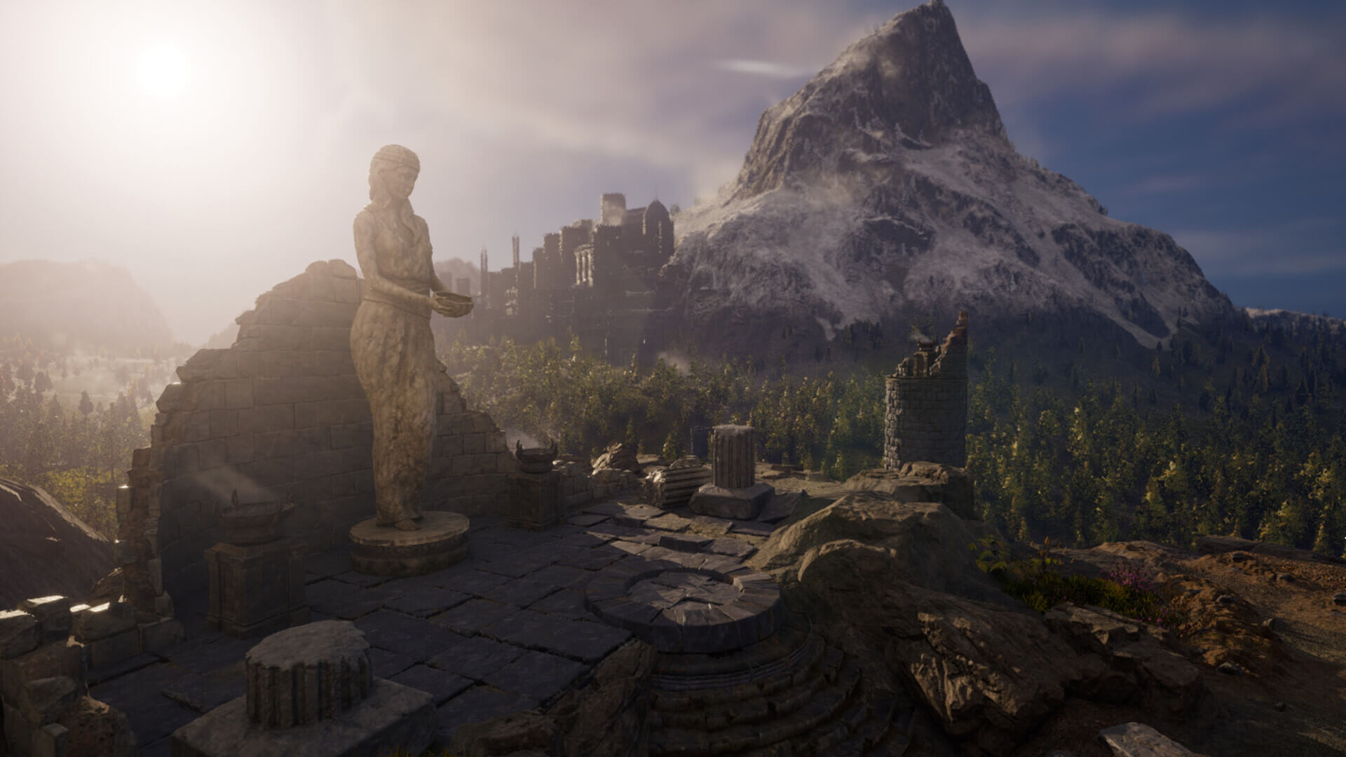 Landscape scene with statue and mountain in the background behind trees