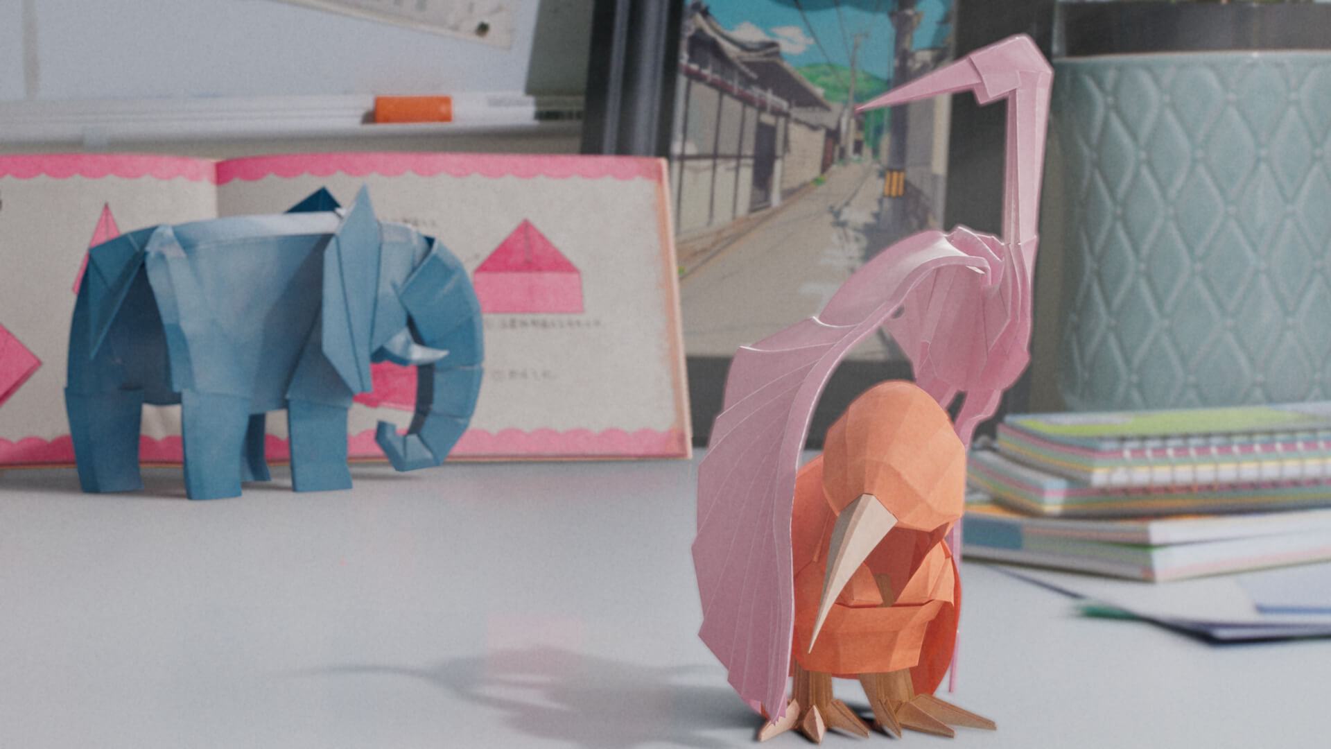 An origami elephant, heron and kiwi