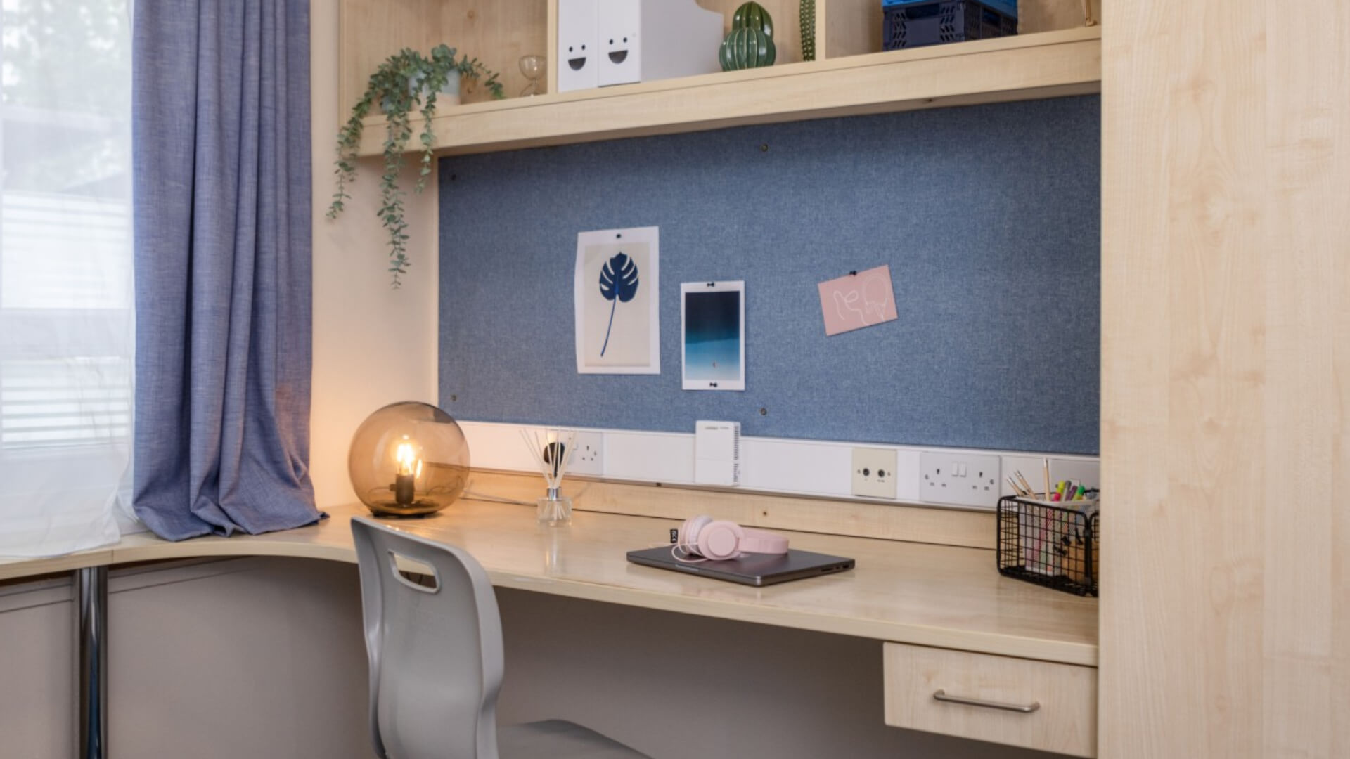 A desk in a bedroom at McMillan Student Village accommodation