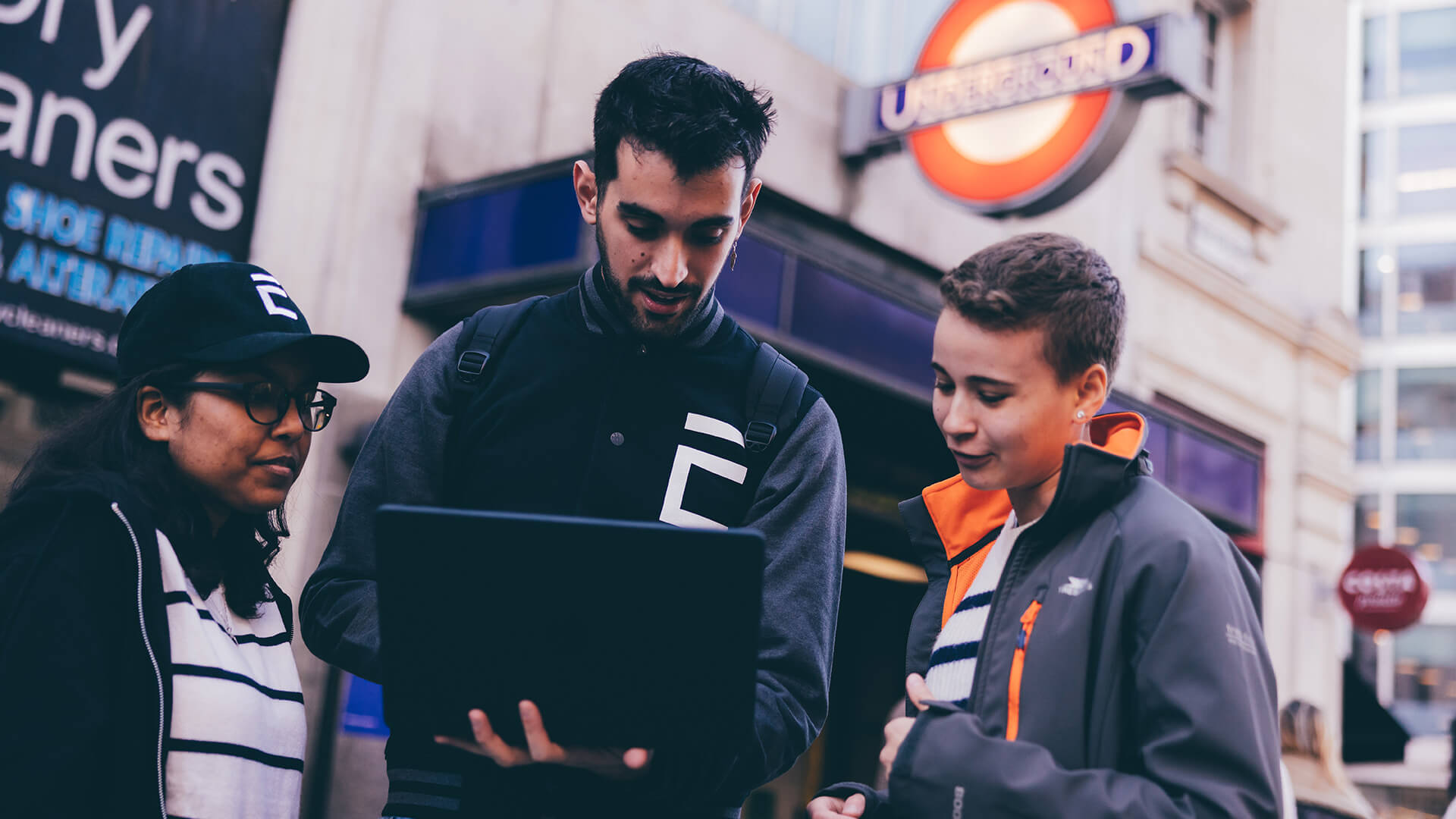 Group of students outside underground station