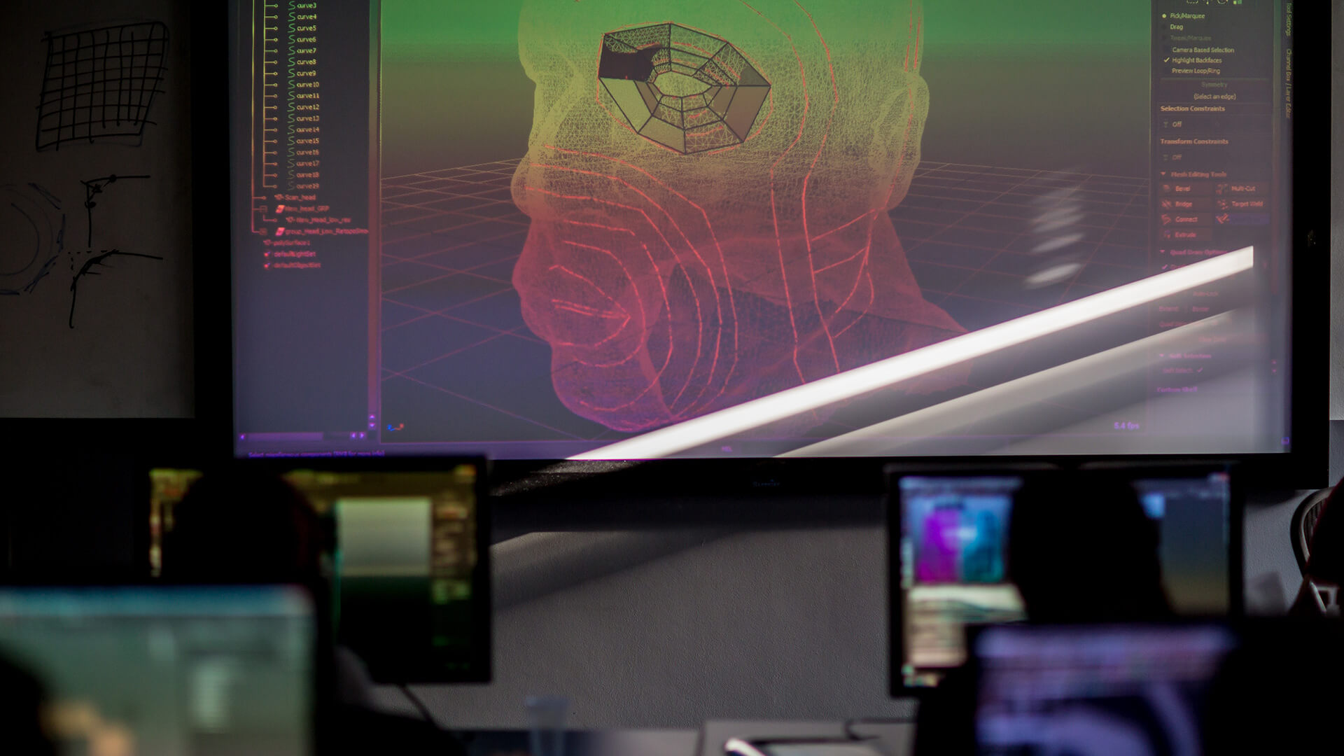 An eye socket being modelled on a projector screen