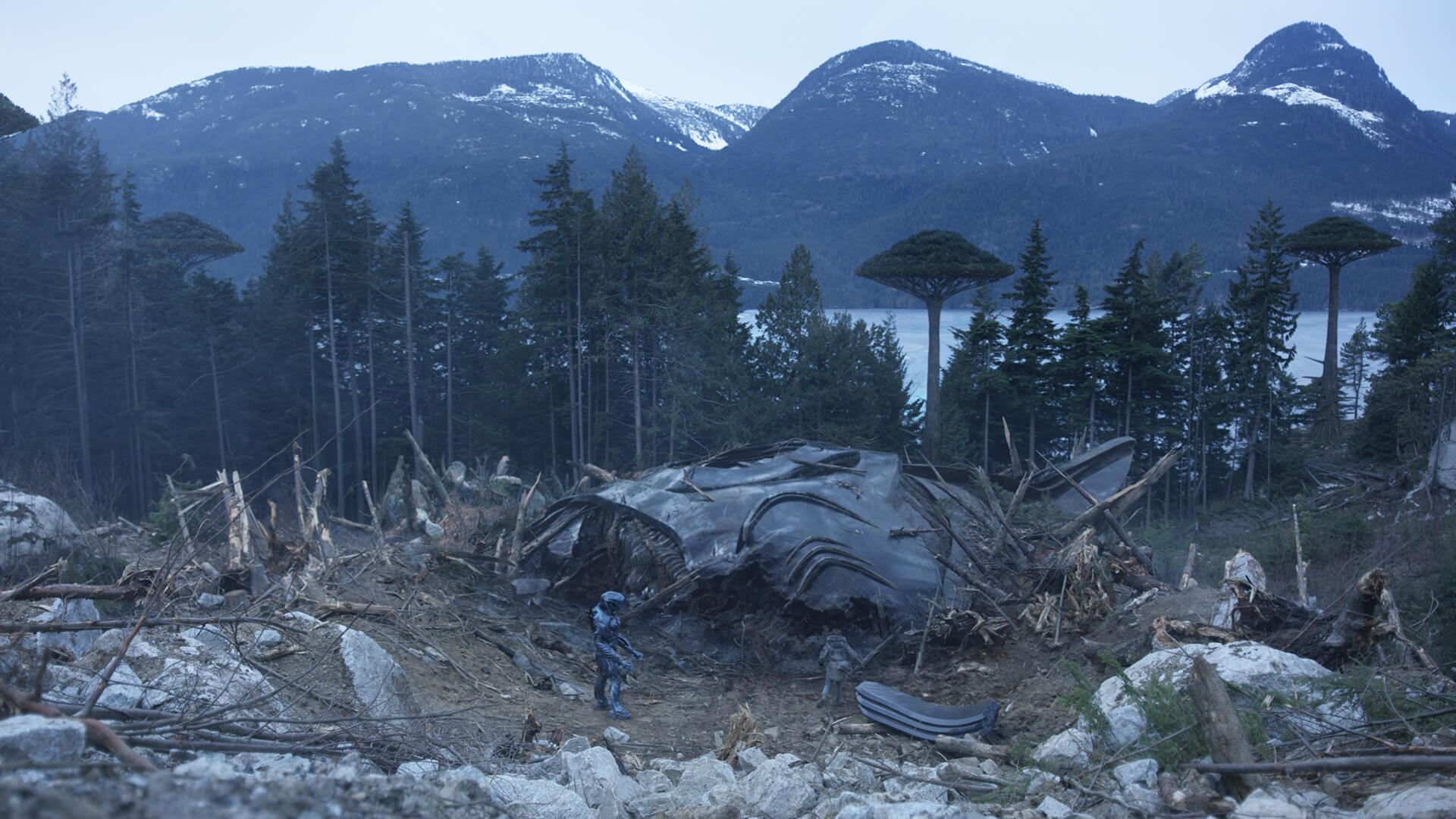 Spaceman stood next to a crashed spaceship