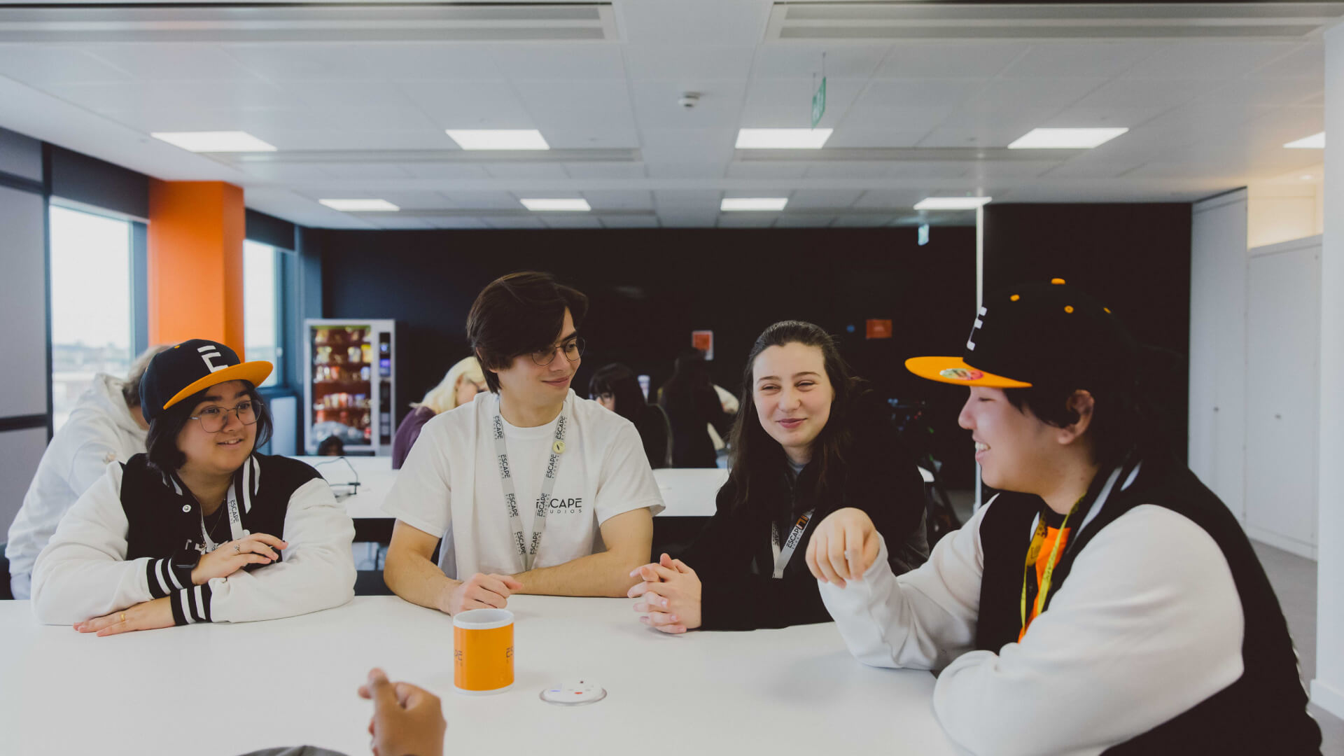 A group of students socialising in the kitchen on the sixth floor