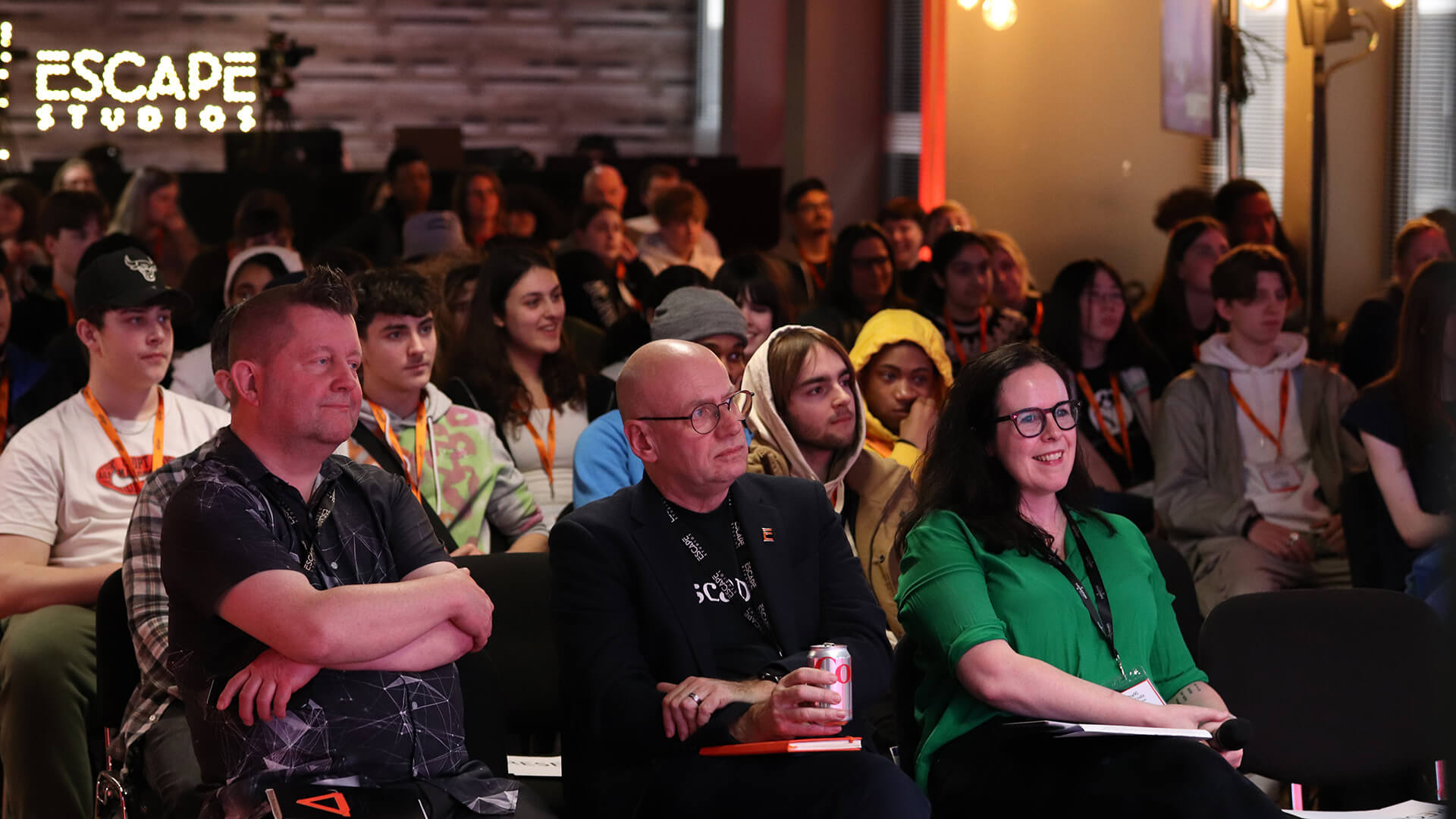 Students & tutors sat in the audience at an event