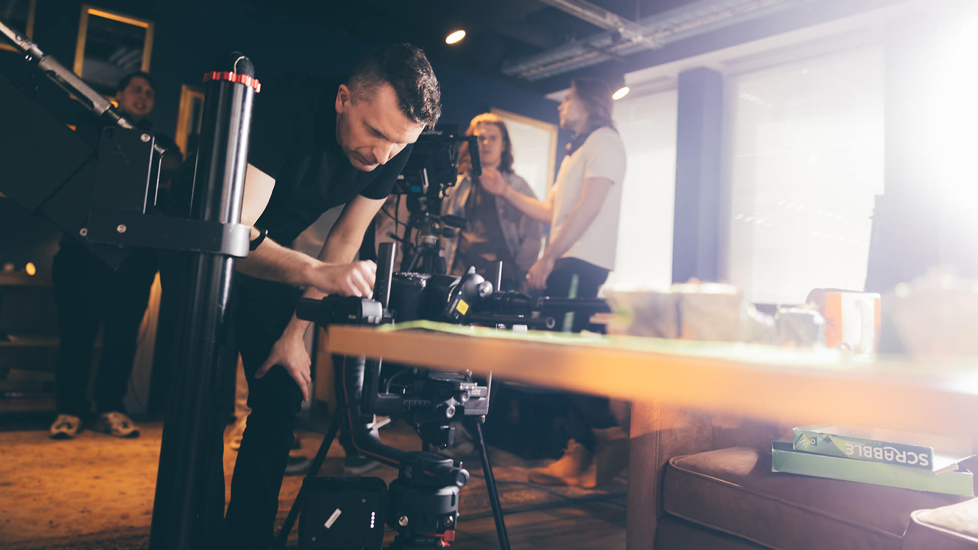 Male setting up camera equipment